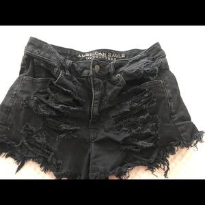 Black ripped shorts